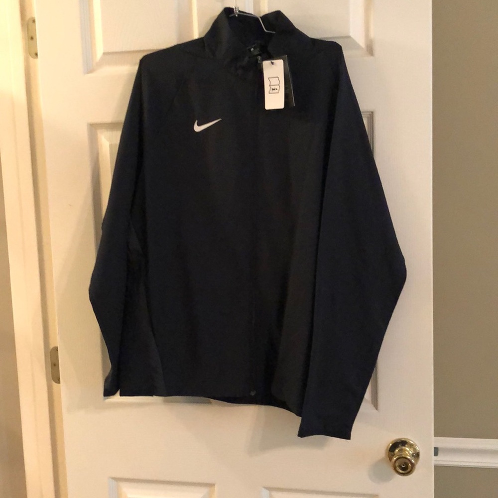 Nike men’s Nike jacket and pants. Size large.